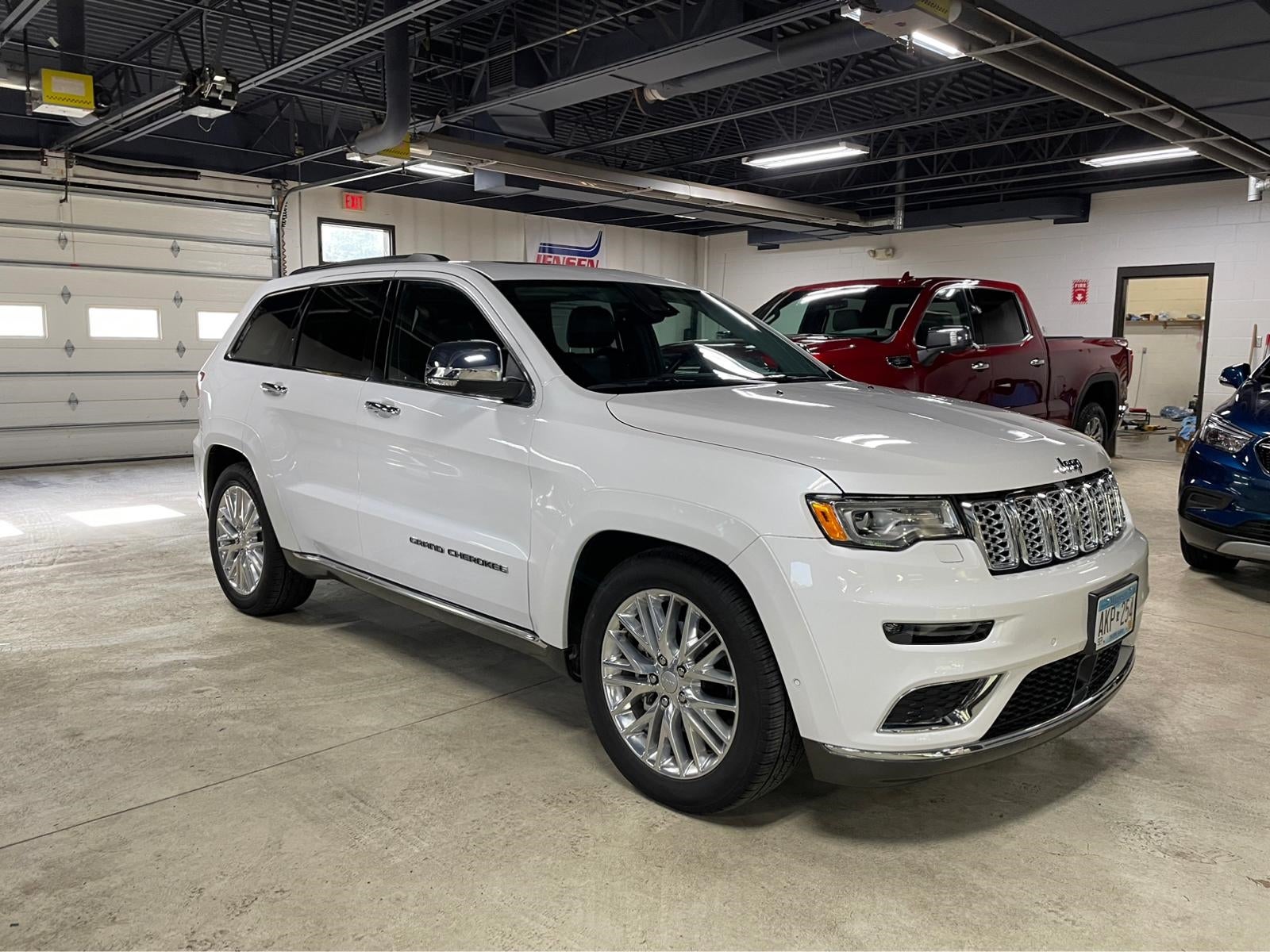 Certified 2018 Jeep Grand Cherokee Summit with VIN 1C4RJFJG3JC180612 for sale in New Ulm, Minnesota