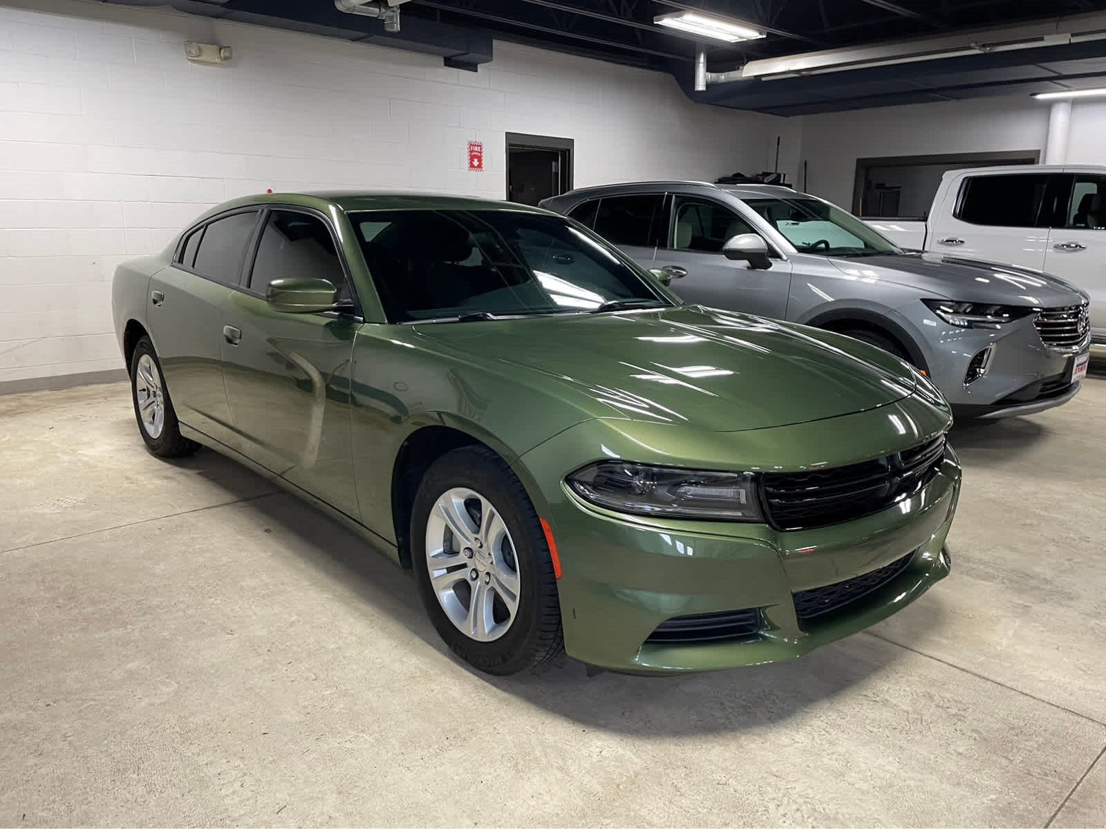 Certified 2021 Dodge Charger SXT with VIN 2C3CDXBG1MH653172 for sale in New Ulm, Minnesota