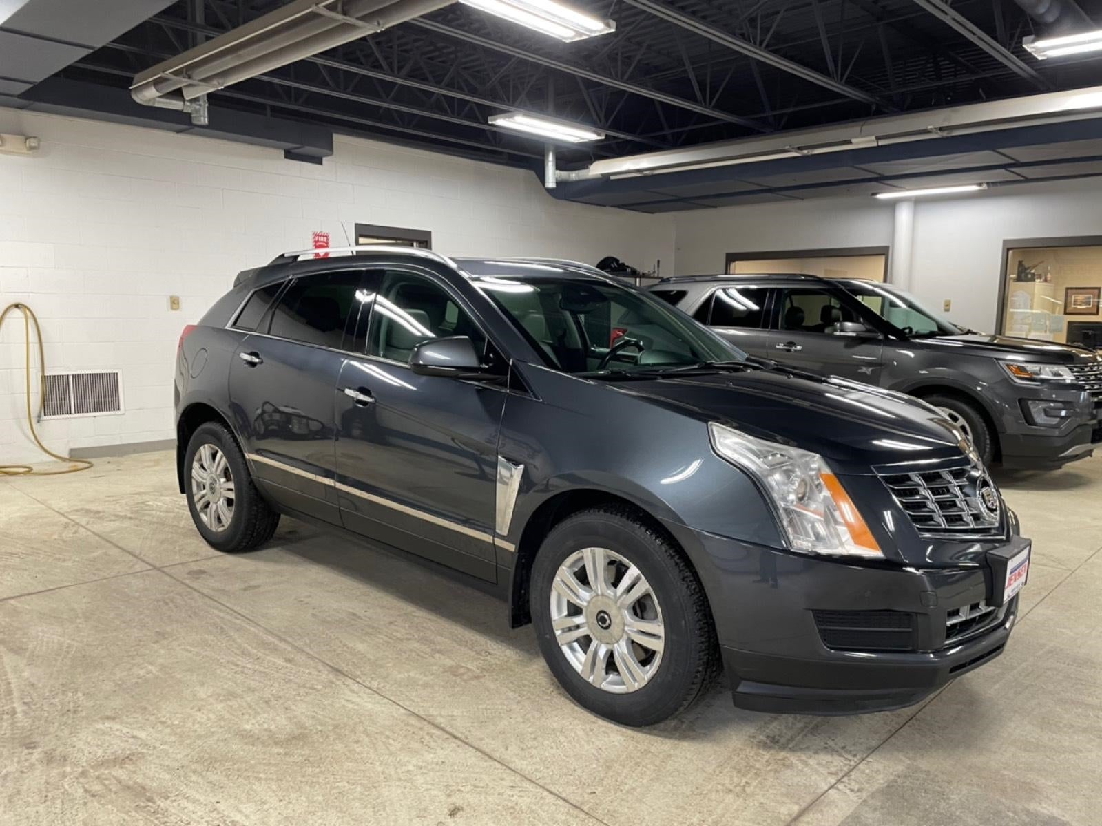 Used 2013 Cadillac SRX Luxury Collection with VIN 3GYFNGE33DS526607 for sale in New Ulm, Minnesota
